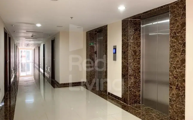 RedLiving Apartemen LoftVilles City - Pelangi Rooms
