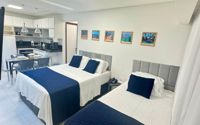 Flat com piscina a 50m da praia
