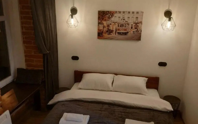 Loft апартаменти з балконом в центрі Львова