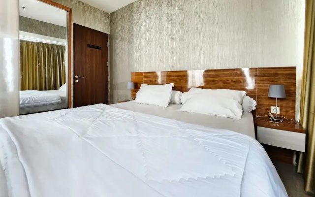 RedLiving Apartemen Grand Kamala Lagoon by owner room