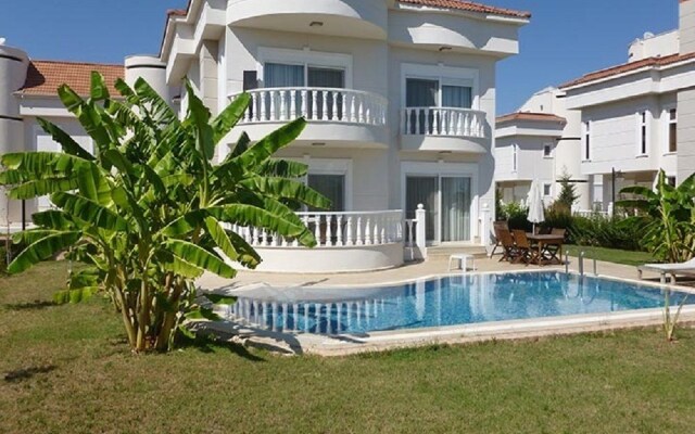 Sadev Turizm Belek Villas & Apartments Турция, Денизяка - отзывы, цены и фото номеров - забронировать отель Sadev Turizm Belek Villas & Apartments онлайн вид на фасад