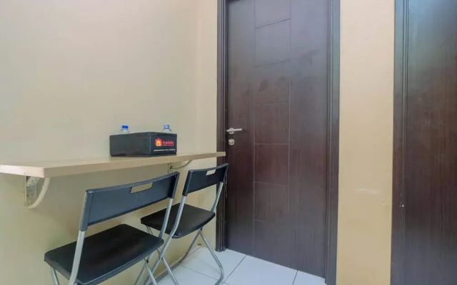 Warm and Homey 2BR Apartment at Kebagusan City