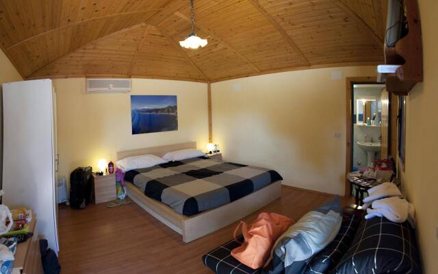 Отель Holiday Sun Lodge Appartamento Vacanze Джардини Наксос комната для гостей