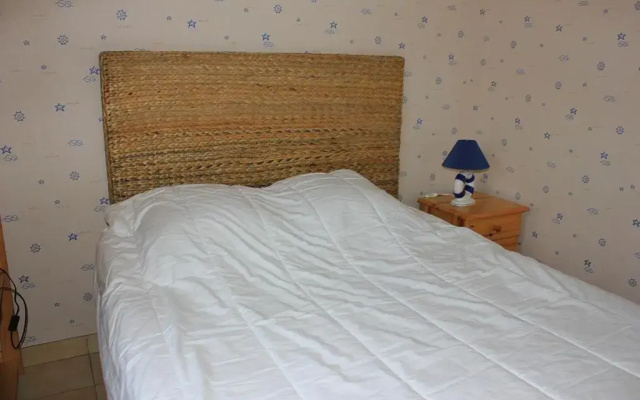 Une sympathique maison de vacances aux volets bleus