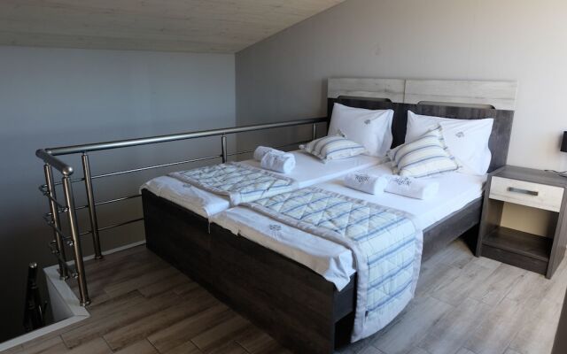 Апартаменты Paramithi Luxury Apartments Ситония комната для гостей