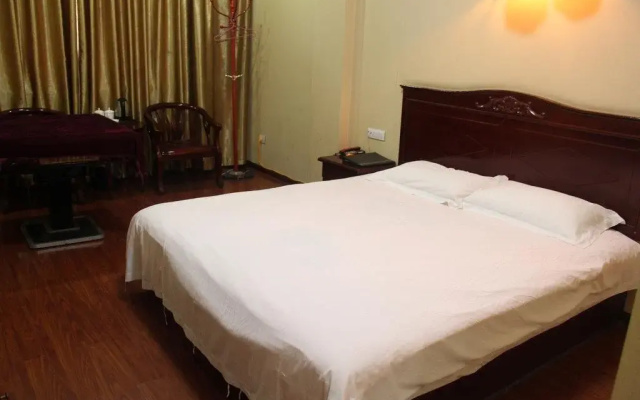 Enshi Junren Business Hotel