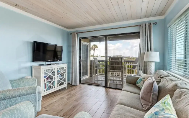 Newly Remodeled Oceanfront Condo with Salt Water Pool and Private Walkway to Beach by RedAwning