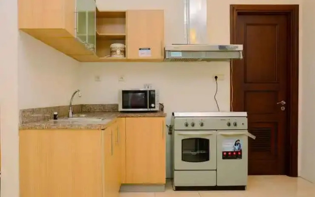 Modern 2BR at The Belleza Apartment By Travelio