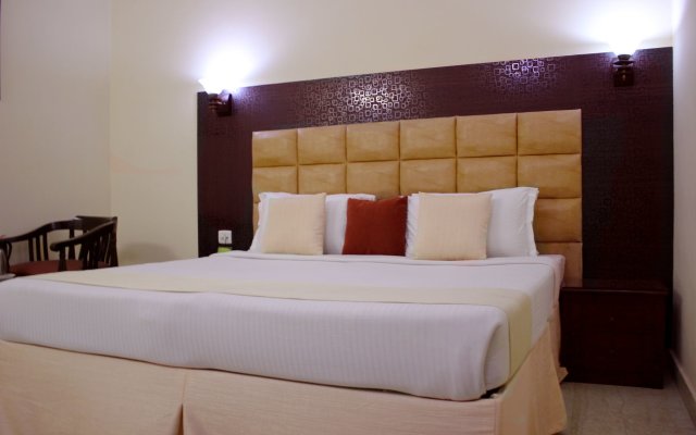 Отель Fabhotel Conclave Comfort East Of Kailash Индия, Нью-Дели - отзывы, цены и фото номеров - забронировать отель Fabhotel Conclave Comfort East Of Kailash онлайн комната для гостей