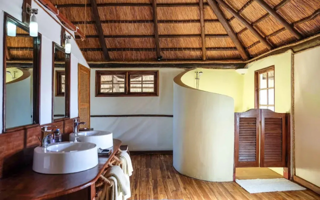 Saadani Safari Lodge - bush, river, beach