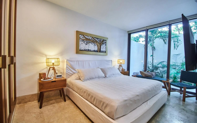 Omara 2-BR Pool · Tropical 2-BR Condo With Private Pool + Amenities!