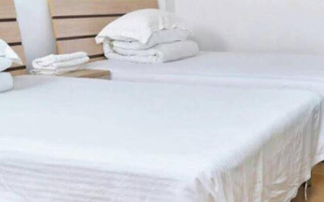 Апартаменты Xingyuan Apartment Сямынь комната для гостей