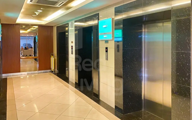 RedLiving Apartemen Grand Kamala Lagoon by owner room