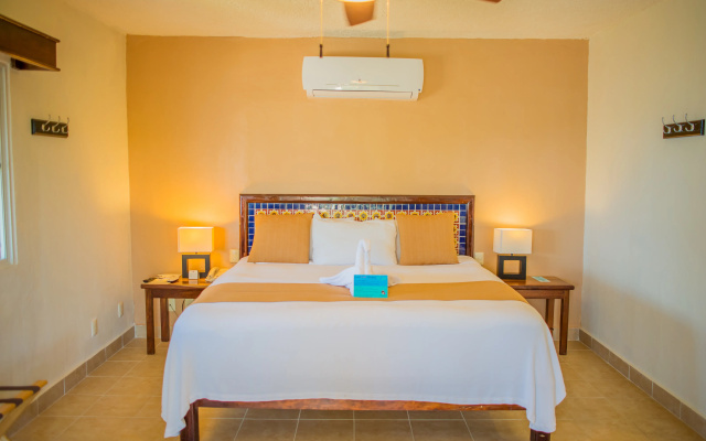 Petit Lafitte Beachfront Hotel & Bungalows