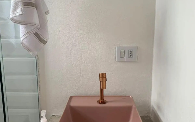 Apartamento com cachoeira no quintal