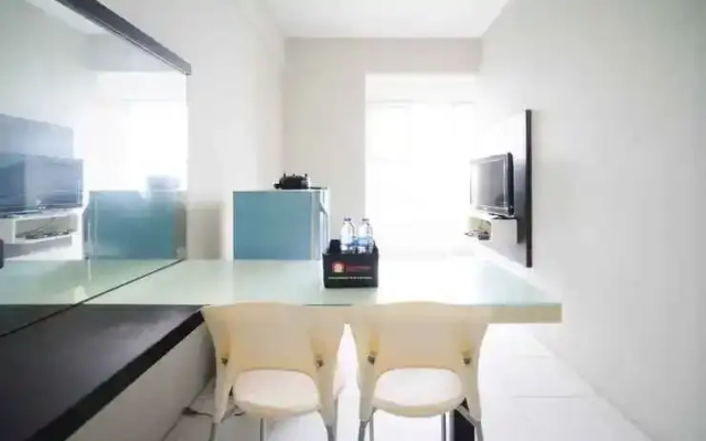 Comfy and Homey 2BR at Dian Regency Apartment By Travelio