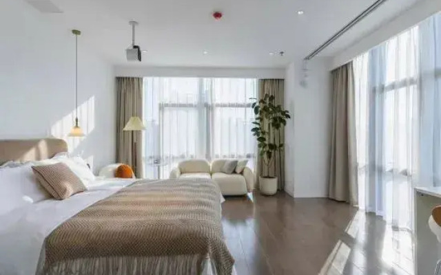 Qianxi Yuexiang Homestay (Erqi Wanda Plaza Jinrong Textile City)
