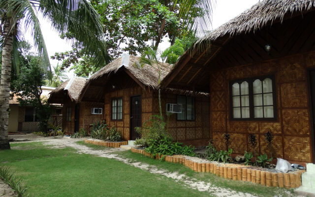 Отель Whites and Greens Beach Resort Филиппины, Дауис - отзывы, цены и фото номеров - забронировать отель Whites and Greens Beach Resort онлайн вид на фасад