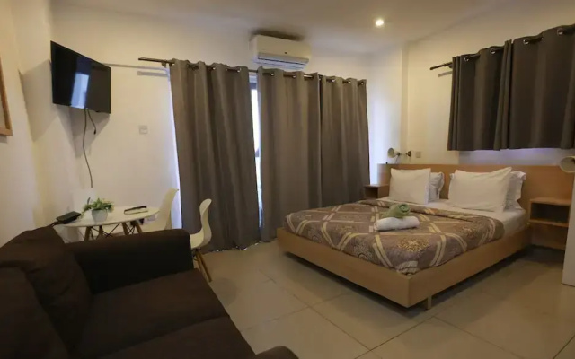 Gallery Luxury Suites by Cozy