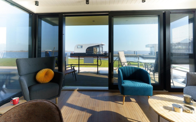 Stylish Boathouse on Lake Sneeker