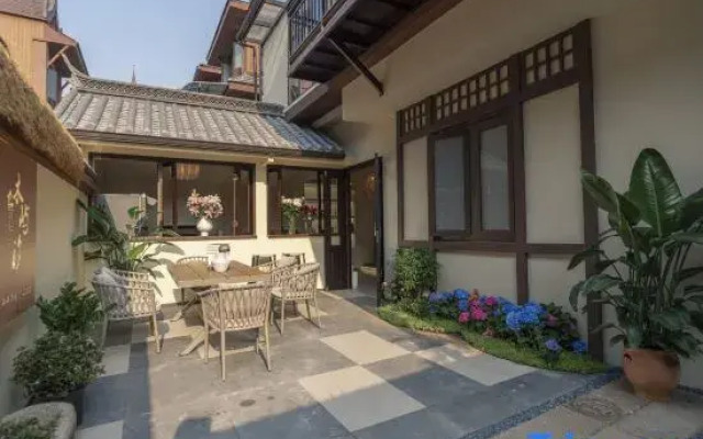 Mangshi Muyuxi Homestay (Dai Ancient Town Branch)