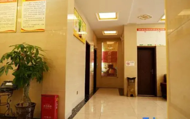 Xuan'en Junhua Business Hotel