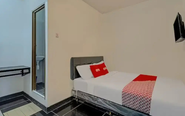 Capital O 3198 Sukomanunggal Inn