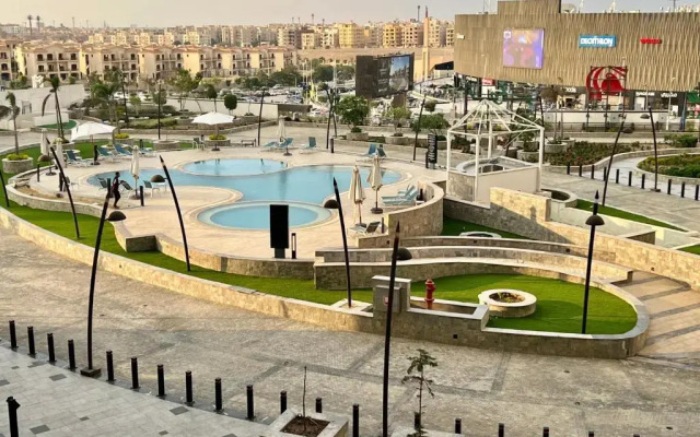 Luxury hotel apartment with pools in front AUC