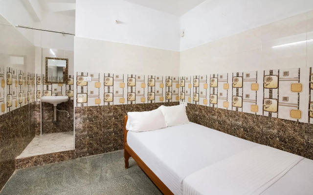 SPOT ON 47779 Thirugnanasamandham Rooms