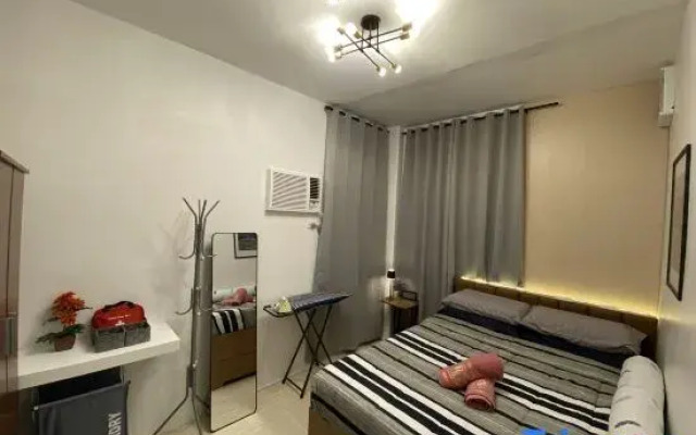 Seven-Eleven Inn 1BR Condo - Royal Oceancrest Mactan