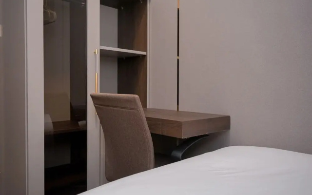 Warm Living 3BR at Sky House BSD Apartment