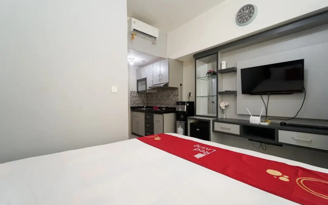 RedLiving Apartemen Springlake Summarecon - Happy Rooms with Netflix
