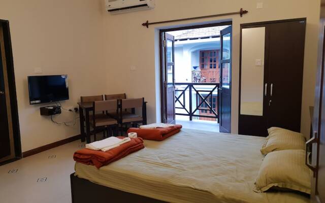 Coastal Suites Apart-Hotel Гоа комната для гостей