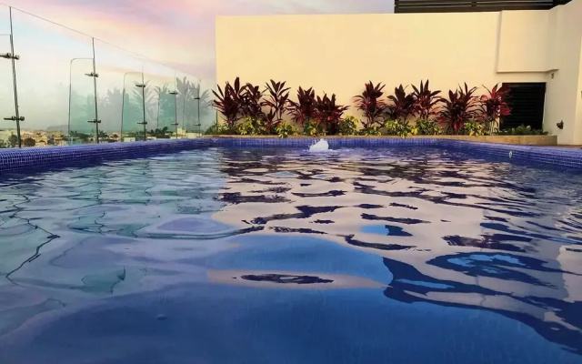 Luxe Condos Complex with Roof Pool
