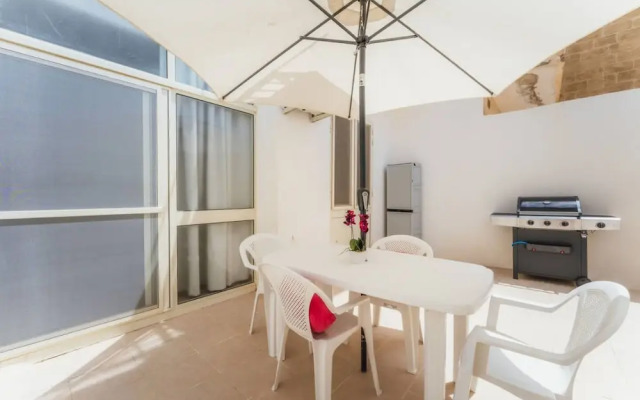 Seafront Gozo Escape BBQ Backyard by Qbajjar Bay