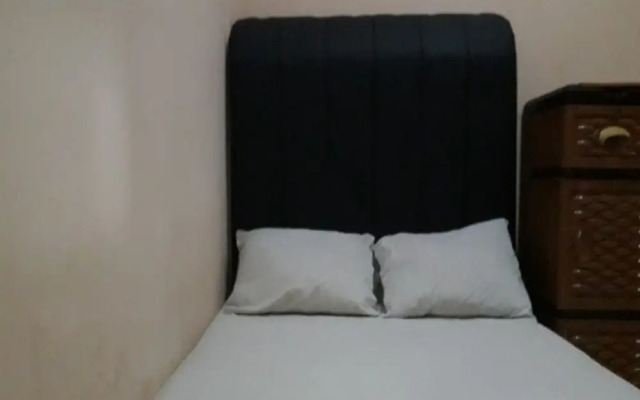 OYO 90706 Kost Alam Jaya Syariah