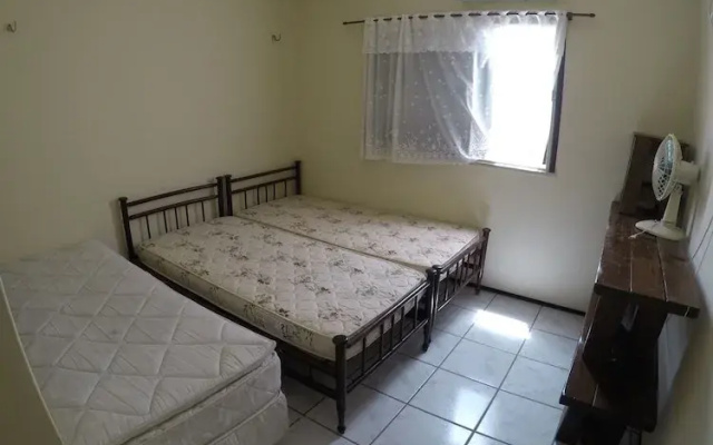 Apto 4 suites com ar para 15 pessoas