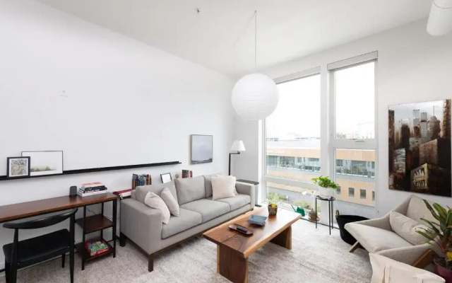 Flexhome Skywalk to Fiserv U2 RooftopGymParking