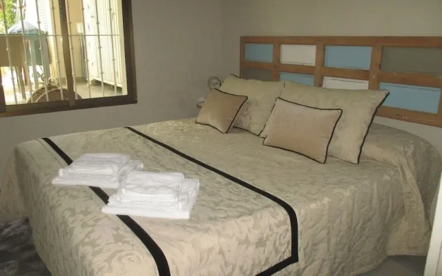 Apartamento Bizcocheros con piscina y jardin