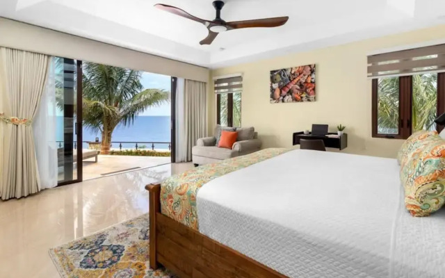 Breathtaking Oceanfront Luxe Villa in Tower Isle Jacuzzi Pool Fully Staffed