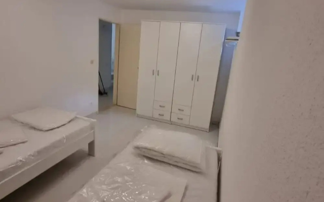 Four Bedroom apt w Patio Close to Beach and Center