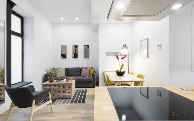 Atocha Apartment by FlatSweetHome