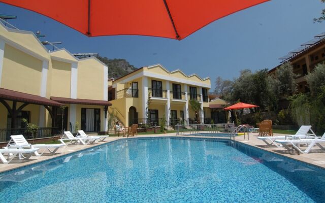 Tokgoz Butik Hotel & Apartments Турция, Олудениз - отзывы, цены и фото номеров - забронировать отель Tokgoz Butik Hotel & Apartments онлайн вид на фасад
