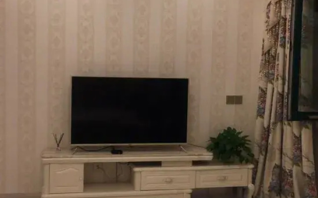 Siping Taotao Apartment