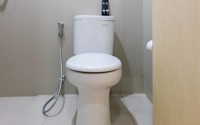 Cozy and Minimalist Studio Apartment @ Tree Park BSD by Travelio