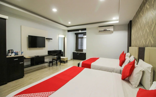 Capital O 15964 NI Ambaari Suites