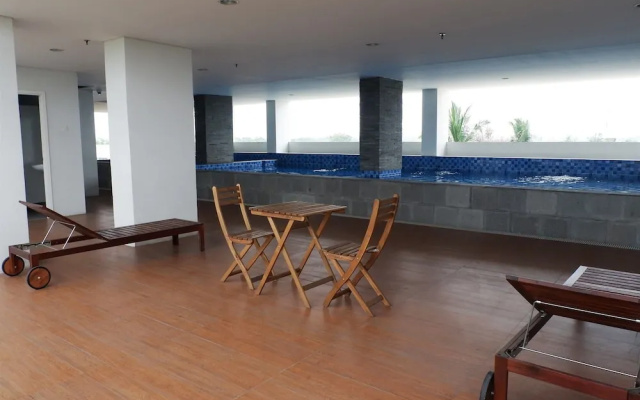 Homey And Cozy Living Studio Poris 88 Apartment