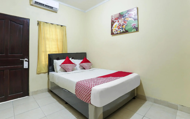 OYO 90907 Handika Jaya Bs