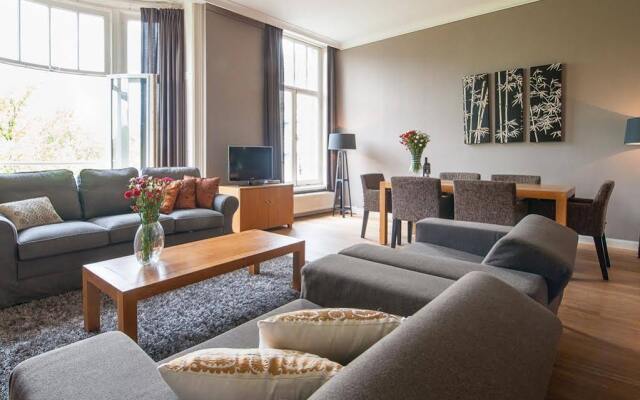 Отель Leidsesquare Luxury Apartment Suites Нидерланды, Амстердам - отзывы, цены и фото номеров - забронировать отель Leidsesquare Luxury Apartment Suites онлайн комната для гостей