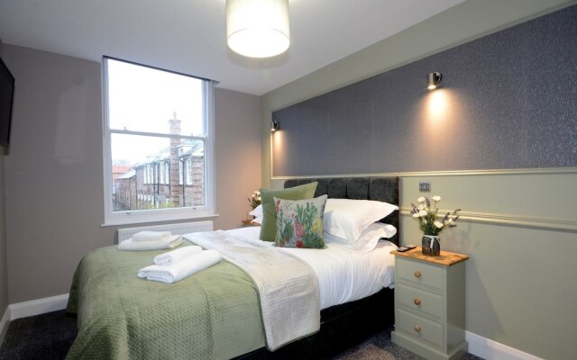 Апартаменты Priory Street Apartment 3 комната для гостей